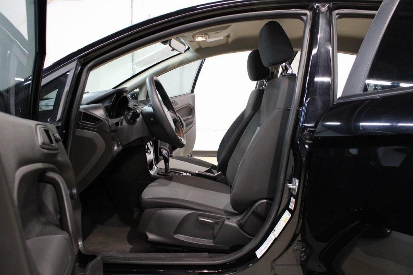 2018 Shadow Black /Charcoal Black Ford Fiesta S (3FADP4AJ3JM) with an 1.6L I4 Ti-VCT engine, Automatic transmission, located at 15300 Midway Rd., Addison, TX, 75001, (972) 702-0011, 32.958321, -96.838074 - Introducing the 2018 Ford Fiesta SE, now available at Midway Auto Group in Addison, Texas. This compact sedan combines efficiency, modern features, and a spirited driving experience, making it an excellent choice for both city commutes and weekend adventures.<br><br>Key Features:<br><br>Engine: 1.6L - Photo#13