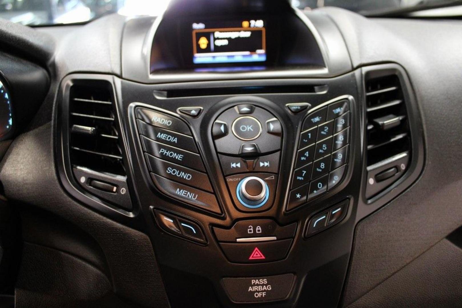 2018 Shadow Black /Charcoal Black Ford Fiesta S (3FADP4AJ3JM) with an 1.6L I4 Ti-VCT engine, Automatic transmission, located at 15300 Midway Rd., Addison, TX, 75001, (972) 702-0011, 32.958321, -96.838074 - Introducing the 2018 Ford Fiesta SE, now available at Midway Auto Group in Addison, Texas. This compact sedan combines efficiency, modern features, and a spirited driving experience, making it an excellent choice for both city commutes and weekend adventures.<br><br>Key Features:<br><br>Engine: 1.6L - Photo#18