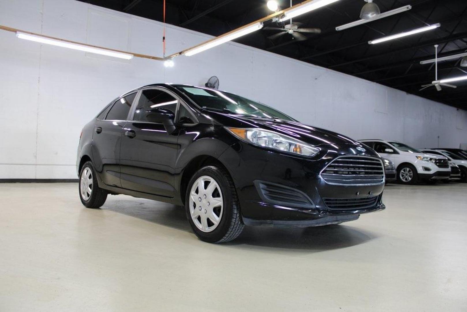 2018 Shadow Black /Charcoal Black Ford Fiesta S (3FADP4AJ3JM) with an 1.6L I4 Ti-VCT engine, Automatic transmission, located at 15300 Midway Rd., Addison, TX, 75001, (972) 702-0011, 32.958321, -96.838074 - Introducing the 2018 Ford Fiesta SE, now available at Midway Auto Group in Addison, Texas. This compact sedan combines efficiency, modern features, and a spirited driving experience, making it an excellent choice for both city commutes and weekend adventures.<br><br>Key Features:<br><br>Engine: 1.6L - Photo#1