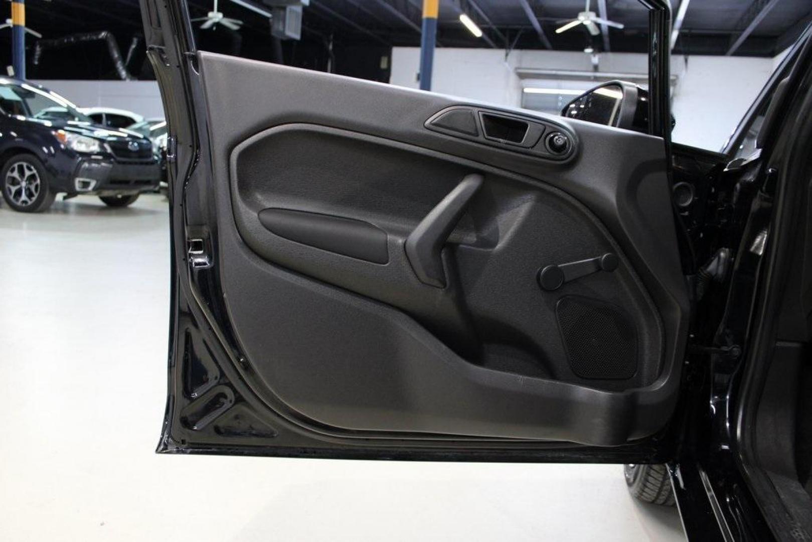 2018 Shadow Black /Charcoal Black Ford Fiesta S (3FADP4AJ3JM) with an 1.6L I4 Ti-VCT engine, Automatic transmission, located at 15300 Midway Rd., Addison, TX, 75001, (972) 702-0011, 32.958321, -96.838074 - Introducing the 2018 Ford Fiesta SE, now available at Midway Auto Group in Addison, Texas. This compact sedan combines efficiency, modern features, and a spirited driving experience, making it an excellent choice for both city commutes and weekend adventures.<br><br>Key Features:<br><br>Engine: 1.6L - Photo#26