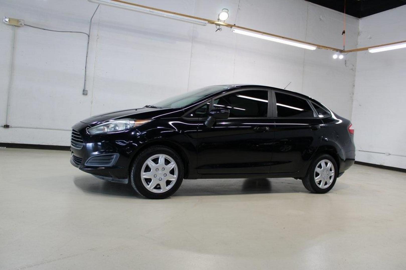 2018 Shadow Black /Charcoal Black Ford Fiesta S (3FADP4AJ3JM) with an 1.6L I4 Ti-VCT engine, Automatic transmission, located at 15300 Midway Rd., Addison, TX, 75001, (972) 702-0011, 32.958321, -96.838074 - Introducing the 2018 Ford Fiesta SE, now available at Midway Auto Group in Addison, Texas. This compact sedan combines efficiency, modern features, and a spirited driving experience, making it an excellent choice for both city commutes and weekend adventures.<br><br>Key Features:<br><br>Engine: 1.6L - Photo#4