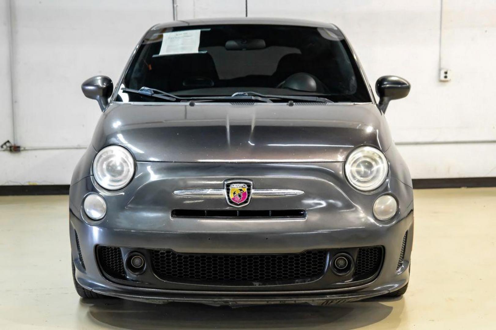 2015 Granito Lucente (Granite Crystal) /Black Fiat 500 Abarth (3C3CFFFH5FT) with an 1.4L I4 16V MultiAir Turbocharged engine, Automatic transmission, located at 15300 Midway Rd., Addison, TX, 75001, (972) 702-0011, 32.958321, -96.838074 - Photo#4