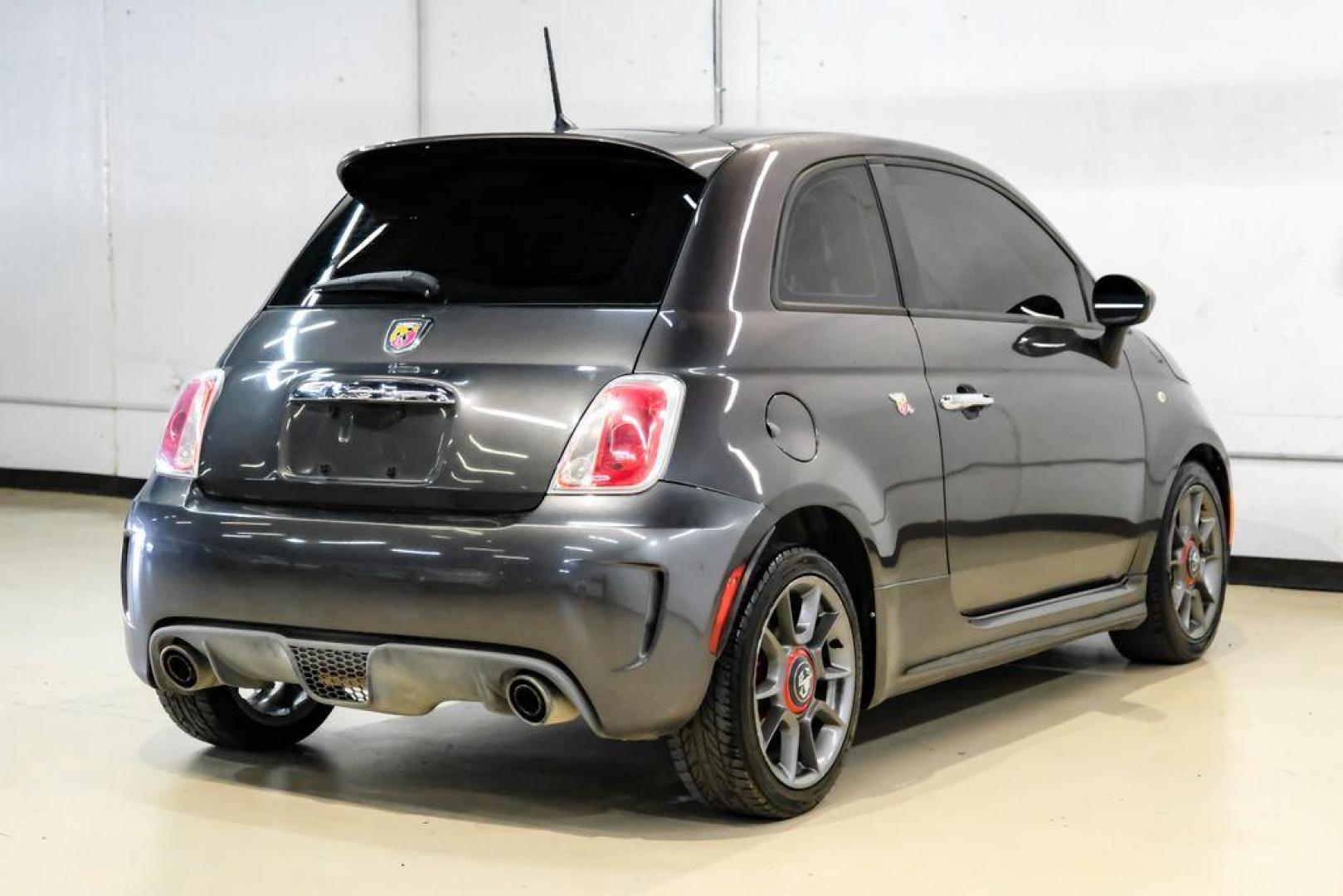 2015 Granito Lucente (Granite Crystal) /Black Fiat 500 Abarth (3C3CFFFH5FT) with an 1.4L I4 16V MultiAir Turbocharged engine, Automatic transmission, located at 15300 Midway Rd., Addison, TX, 75001, (972) 702-0011, 32.958321, -96.838074 - Photo#7
