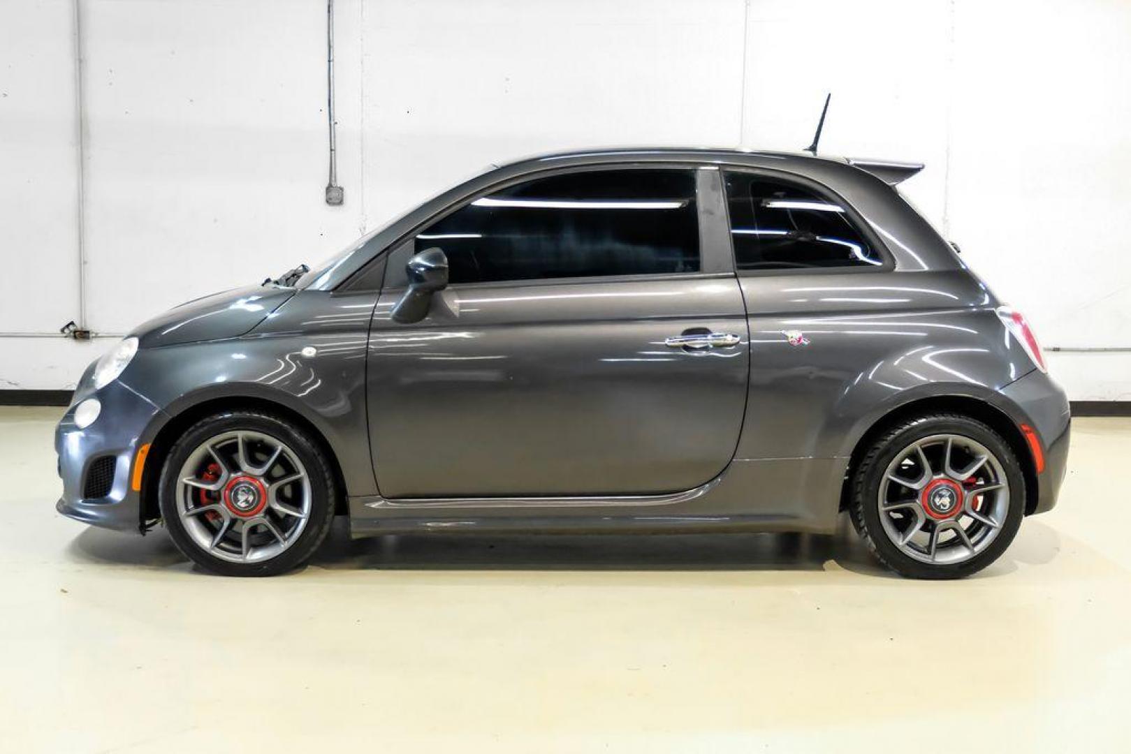 2015 Granito Lucente (Granite Crystal) /Black Fiat 500 Abarth (3C3CFFFH5FT) with an 1.4L I4 16V MultiAir Turbocharged engine, Automatic transmission, located at 15300 Midway Rd., Addison, TX, 75001, (972) 702-0011, 32.958321, -96.838074 - Photo#10