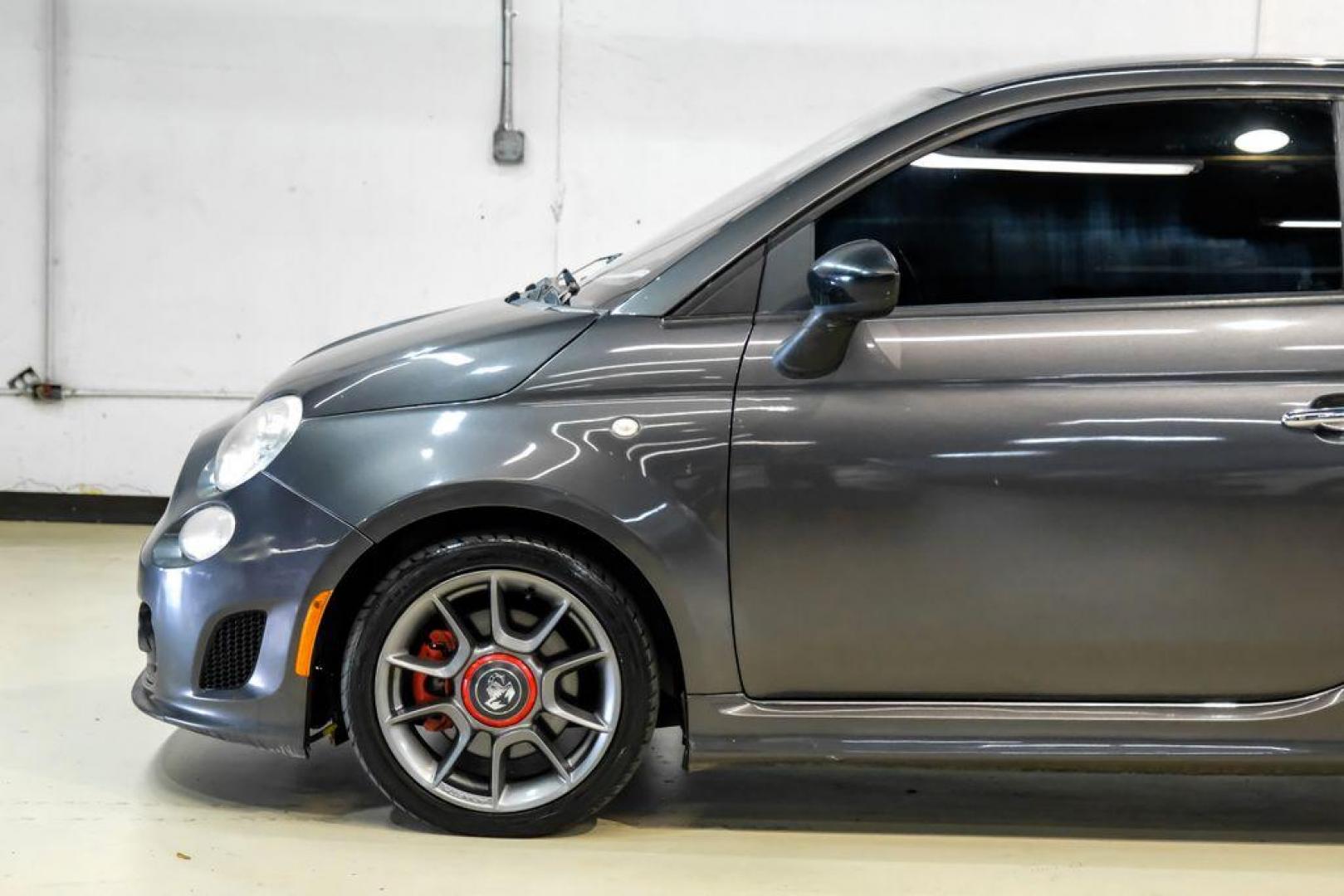 2015 Granito Lucente (Granite Crystal) /Black Fiat 500 Abarth (3C3CFFFH5FT) with an 1.4L I4 16V MultiAir Turbocharged engine, Automatic transmission, located at 15300 Midway Rd., Addison, TX, 75001, (972) 702-0011, 32.958321, -96.838074 - Photo#11