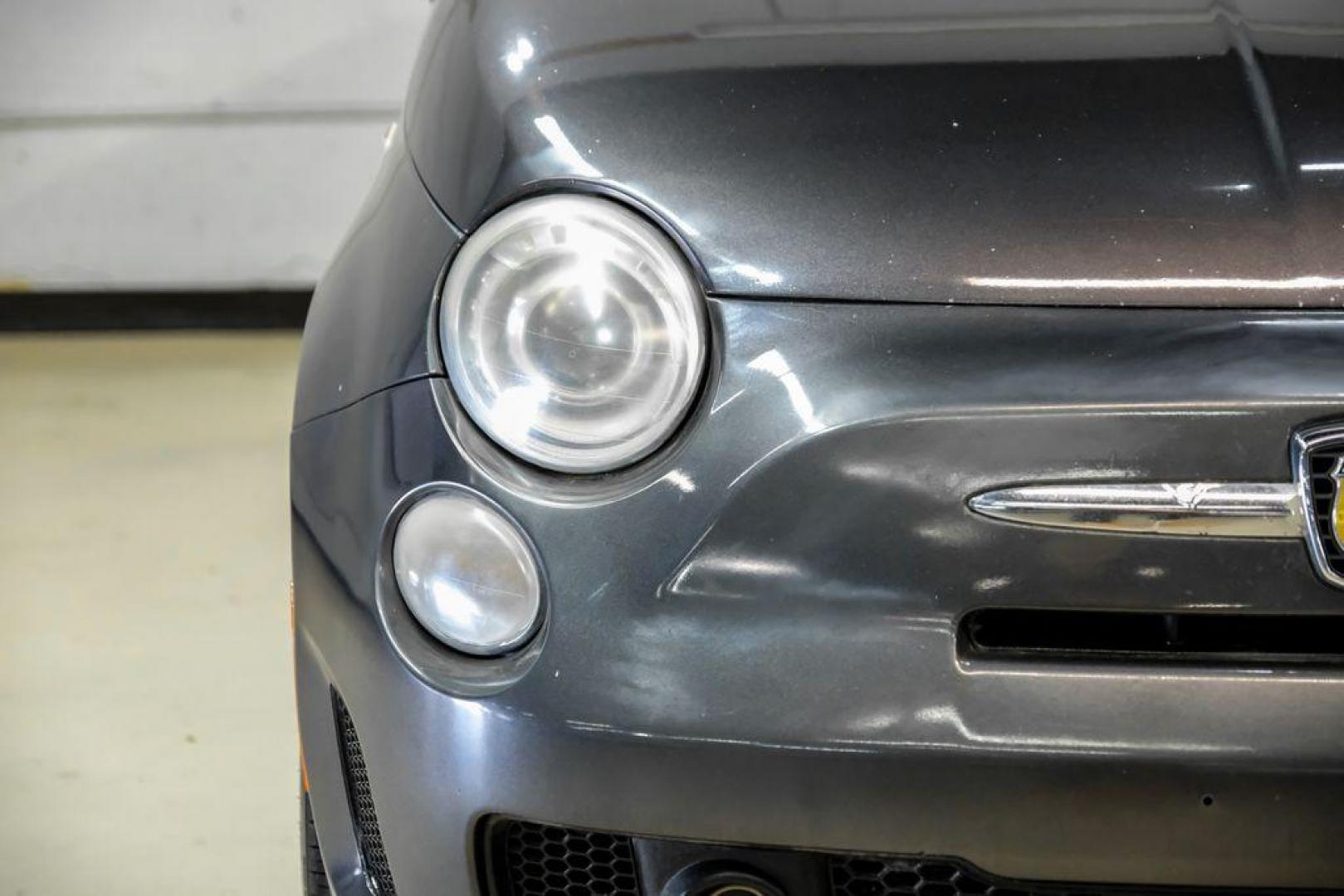 2015 Granito Lucente (Granite Crystal) /Black Fiat 500 Abarth (3C3CFFFH5FT) with an 1.4L I4 16V MultiAir Turbocharged engine, Automatic transmission, located at 15300 Midway Rd., Addison, TX, 75001, (972) 702-0011, 32.958321, -96.838074 - Photo#32