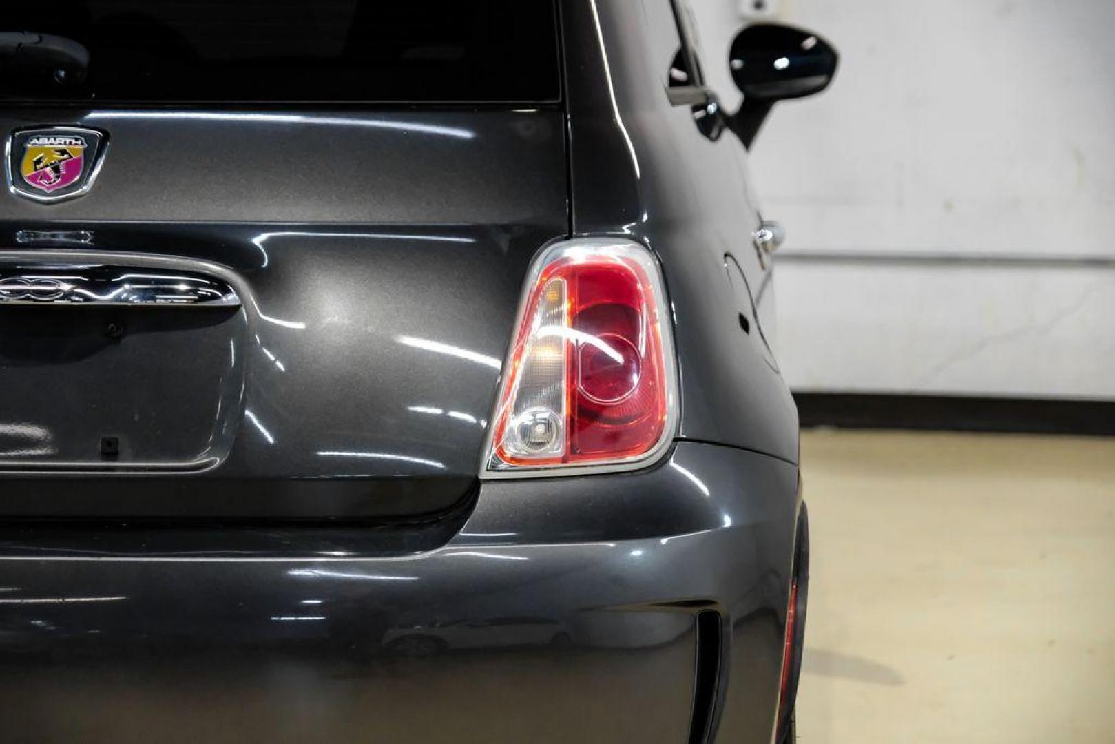 2015 Granito Lucente (Granite Crystal) /Black Fiat 500 Abarth (3C3CFFFH5FT) with an 1.4L I4 16V MultiAir Turbocharged engine, Automatic transmission, located at 15300 Midway Rd., Addison, TX, 75001, (972) 702-0011, 32.958321, -96.838074 - Photo#33