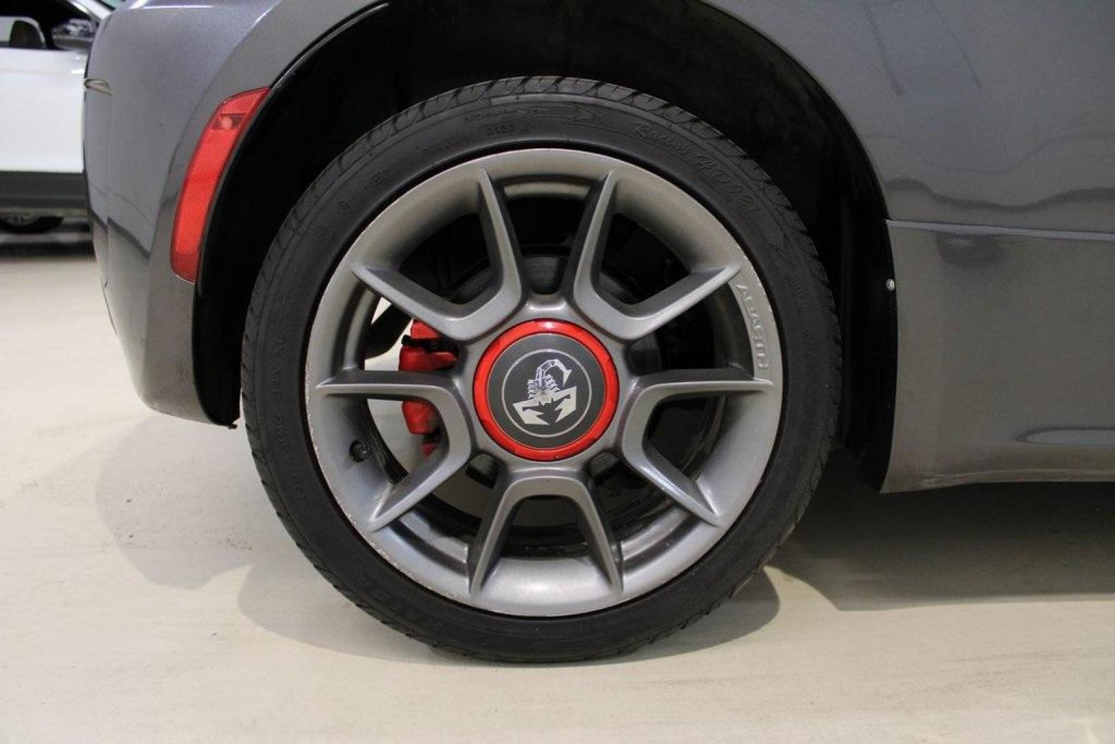 2015 Granito Lucente (Granite Crystal) /Black Fiat 500 Abarth (3C3CFFFH5FT) with an 1.4L I4 16V MultiAir Turbocharged engine, Automatic transmission, located at 15300 Midway Rd., Addison, TX, 75001, (972) 702-0011, 32.958321, -96.838074 - HOME OF THE NO HAGGLE PRICE - WHOLESALE PRICES TO THE PUBLIC!! 500 Abarth, 2D Hatchback, 1.4L I4 16V MultiAir Turbocharged, 6-Speed Automatic, FWD, Granito Lucente (Granite Crystal), Black Cloth.<br><br>Granito Lucente (Granite Crystal) 2015 Fiat 500 Abarth<br><br>24/32 City/Highway MPG<br><br>Award - Photo#10