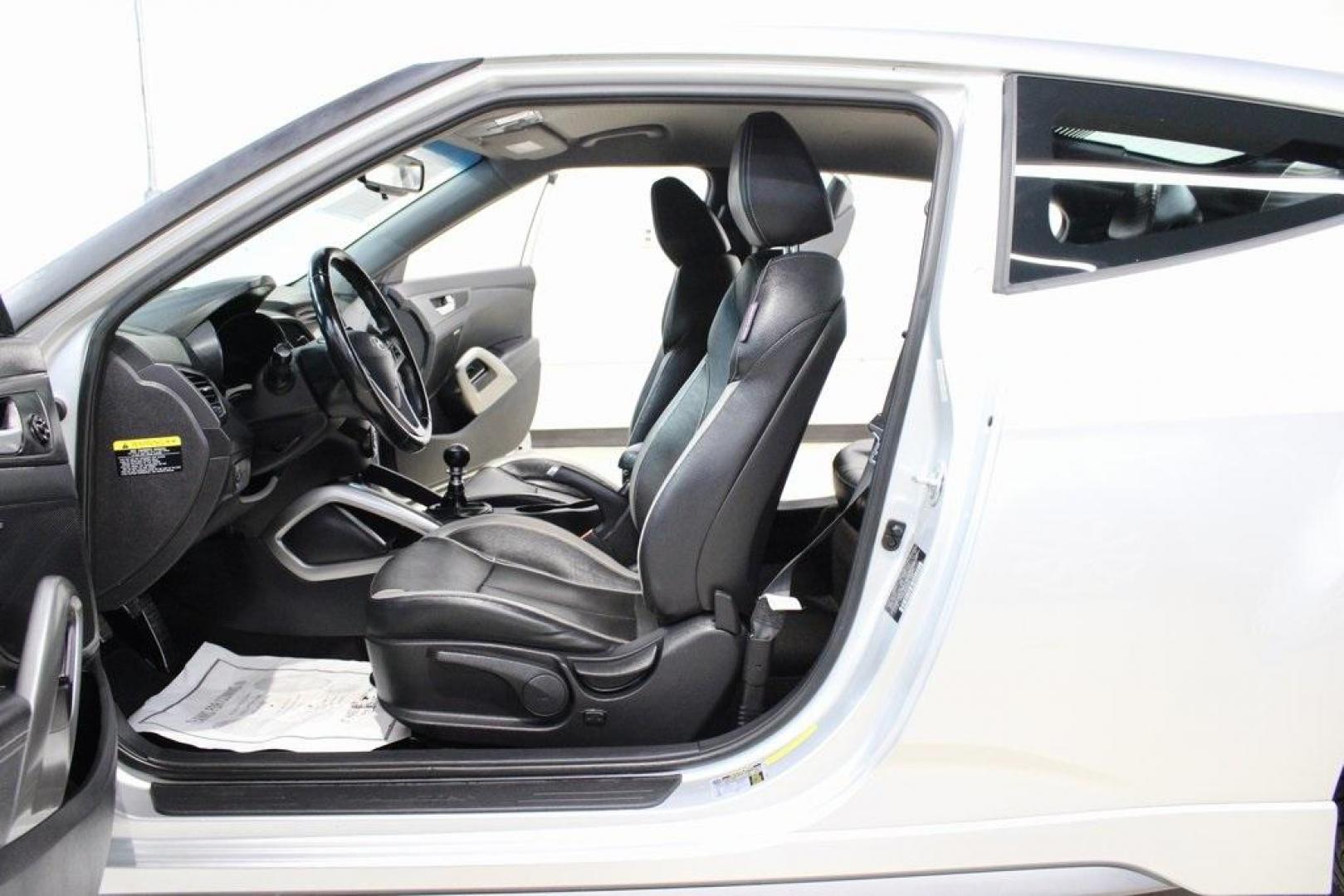 2014 Ironman Silver Metallic /Black Hyundai Veloster Turbo (KMHTC6AEXEU) with an 1.6L I4 DGI DOHC 16V Turbocharged engine, Manual transmission, located at 15300 Midway Rd., Addison, TX, 75001, (972) 702-0011, 32.958321, -96.838074 - Introducing the 2014 Hyundai Veloster Turbo, now available at Midway Auto Group in Addison, Texas. This distinctive hatchback combines sporty performance with innovative design, offering a driving experience that's both exhilarating and practical.<br><br>Key Features:<br><br>Engine: 1.6L Turbocharge - Photo#13