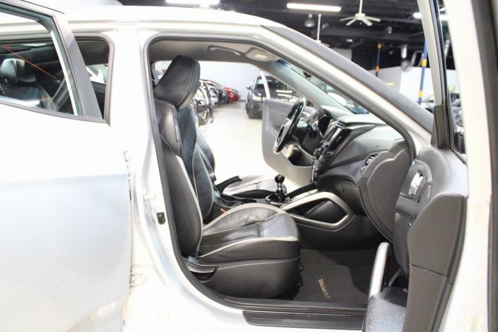2014 Ironman Silver Metallic /Black Hyundai Veloster Turbo (KMHTC6AEXEU) with an 1.6L I4 DGI DOHC 16V Turbocharged engine, Manual transmission, located at 15300 Midway Rd., Addison, TX, 75001, (972) 702-0011, 32.958321, -96.838074 - Introducing the 2014 Hyundai Veloster Turbo, now available at Midway Auto Group in Addison, Texas. This distinctive hatchback combines sporty performance with innovative design, offering a driving experience that's both exhilarating and practical.<br><br>Key Features:<br><br>Engine: 1.6L Turbocharge - Photo#14
