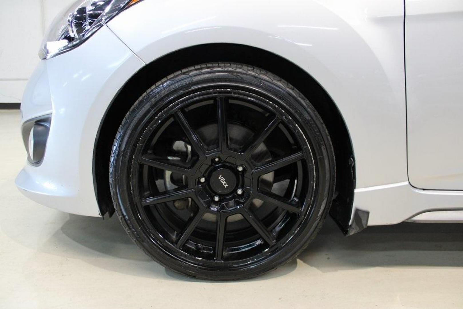 2014 Ironman Silver Metallic /Black Hyundai Veloster Turbo (KMHTC6AEXEU) with an 1.6L I4 DGI DOHC 16V Turbocharged engine, Manual transmission, located at 15300 Midway Rd., Addison, TX, 75001, (972) 702-0011, 32.958321, -96.838074 - Introducing the 2014 Hyundai Veloster Turbo, now available at Midway Auto Group in Addison, Texas. This distinctive hatchback combines sporty performance with innovative design, offering a driving experience that's both exhilarating and practical.<br><br>Key Features:<br><br>Engine: 1.6L Turbocharge - Photo#8