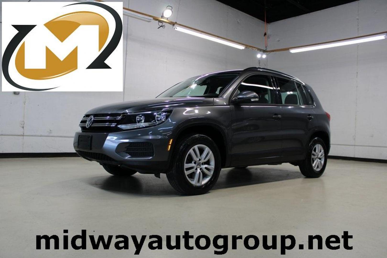 2016 Pepper / Gray /Charcoal Black Volkswagen Tiguan S (WVGAV7AX2GW) with an 2.0L 4-Cylinder Turbocharged engine, Automatic transmission, located at 15300 Midway Rd., Addison, TX, 75001, (972) 702-0011, 32.958321, -96.838074 - Photo#0