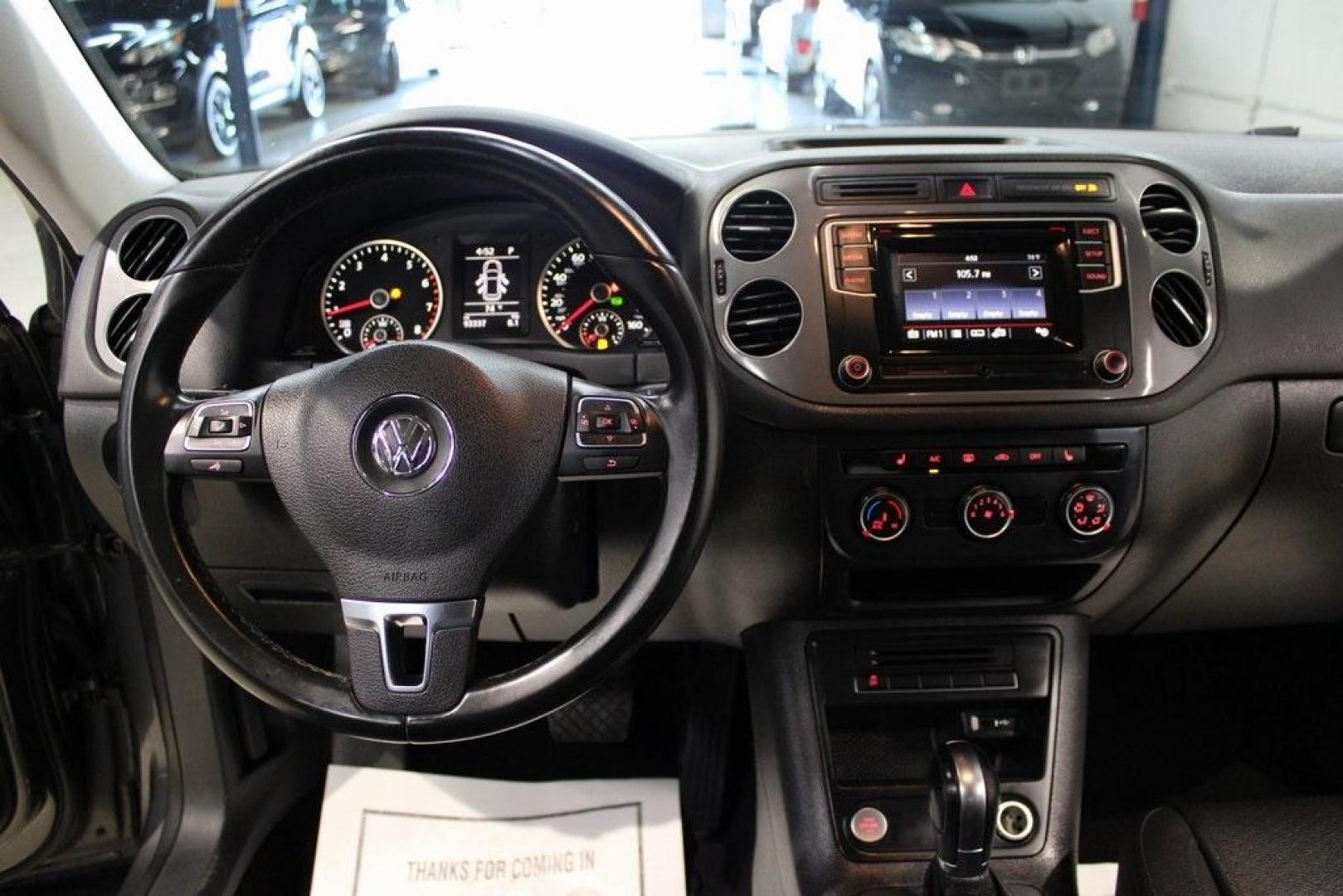 2016 Pepper / Gray /Charcoal Black Volkswagen Tiguan S (WVGAV7AX2GW) with an 2.0L 4-Cylinder Turbocharged engine, Automatic transmission, located at 15300 Midway Rd., Addison, TX, 75001, (972) 702-0011, 32.958321, -96.838074 - Photo#16