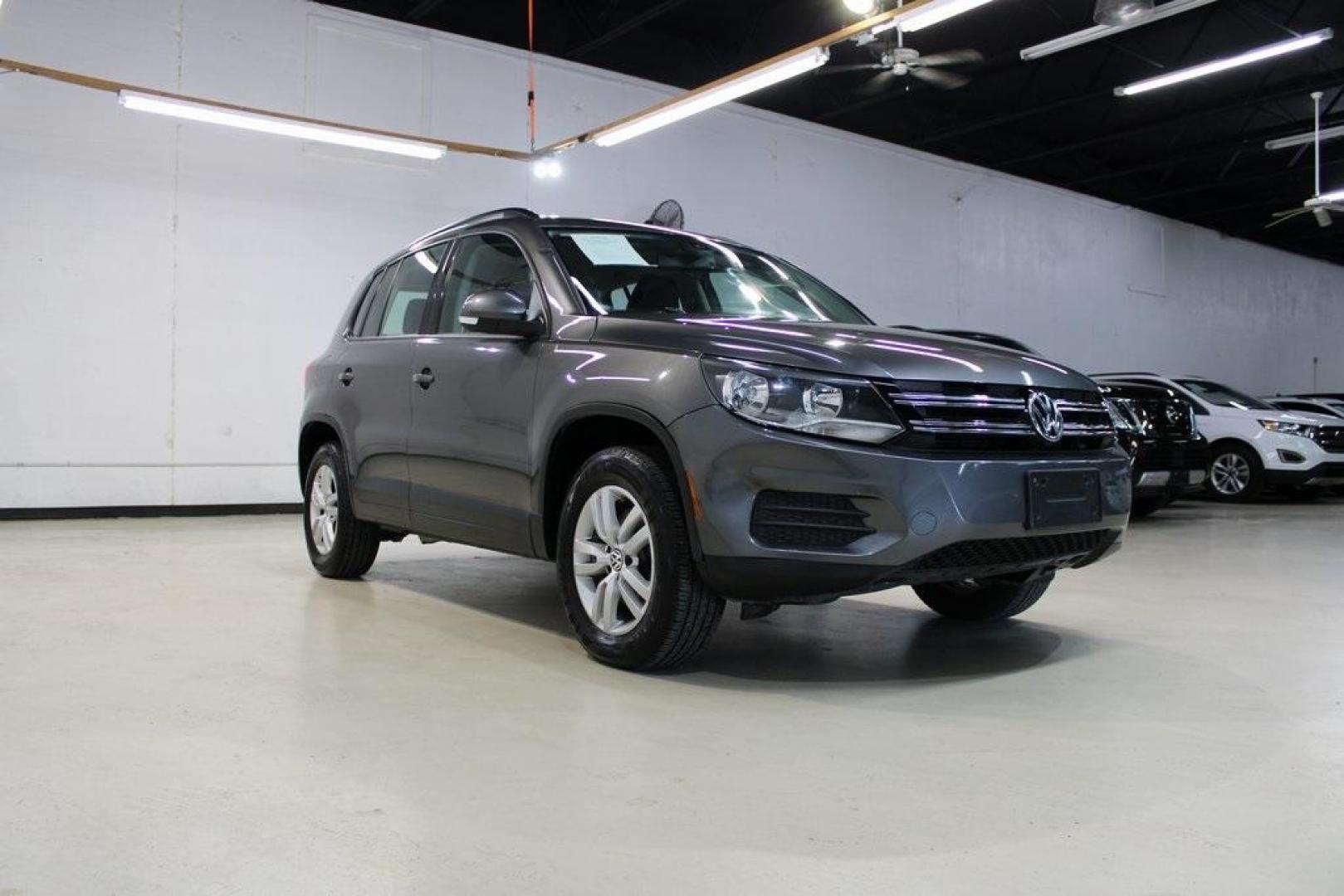 2016 Pepper / Gray /Charcoal Black Volkswagen Tiguan S (WVGAV7AX2GW) with an 2.0L 4-Cylinder Turbocharged engine, Automatic transmission, located at 15300 Midway Rd., Addison, TX, 75001, (972) 702-0011, 32.958321, -96.838074 - Photo#1