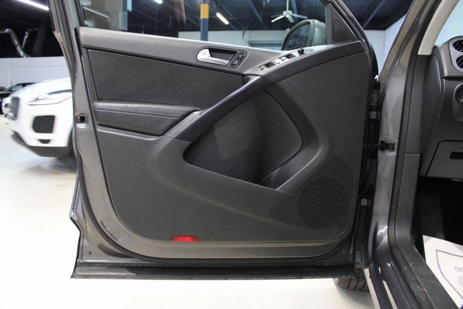 2016 Pepper / Gray /Charcoal Black Volkswagen Tiguan S (WVGAV7AX2GW) with an 2.0L 4-Cylinder Turbocharged engine, Automatic transmission, located at 15300 Midway Rd., Addison, TX, 75001, (972) 702-0011, 32.958321, -96.838074 - Photo#25