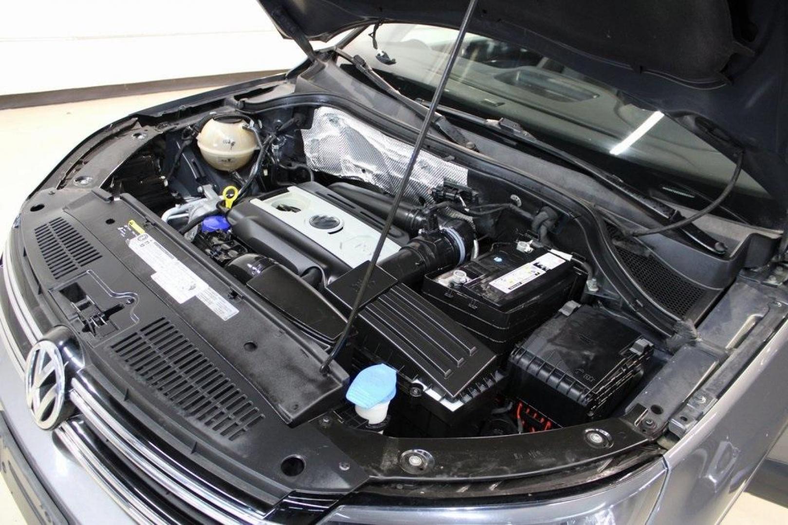 2016 Pepper / Gray /Charcoal Black Volkswagen Tiguan S (WVGAV7AX2GW) with an 2.0L 4-Cylinder Turbocharged engine, Automatic transmission, located at 15300 Midway Rd., Addison, TX, 75001, (972) 702-0011, 32.958321, -96.838074 - Photo#28