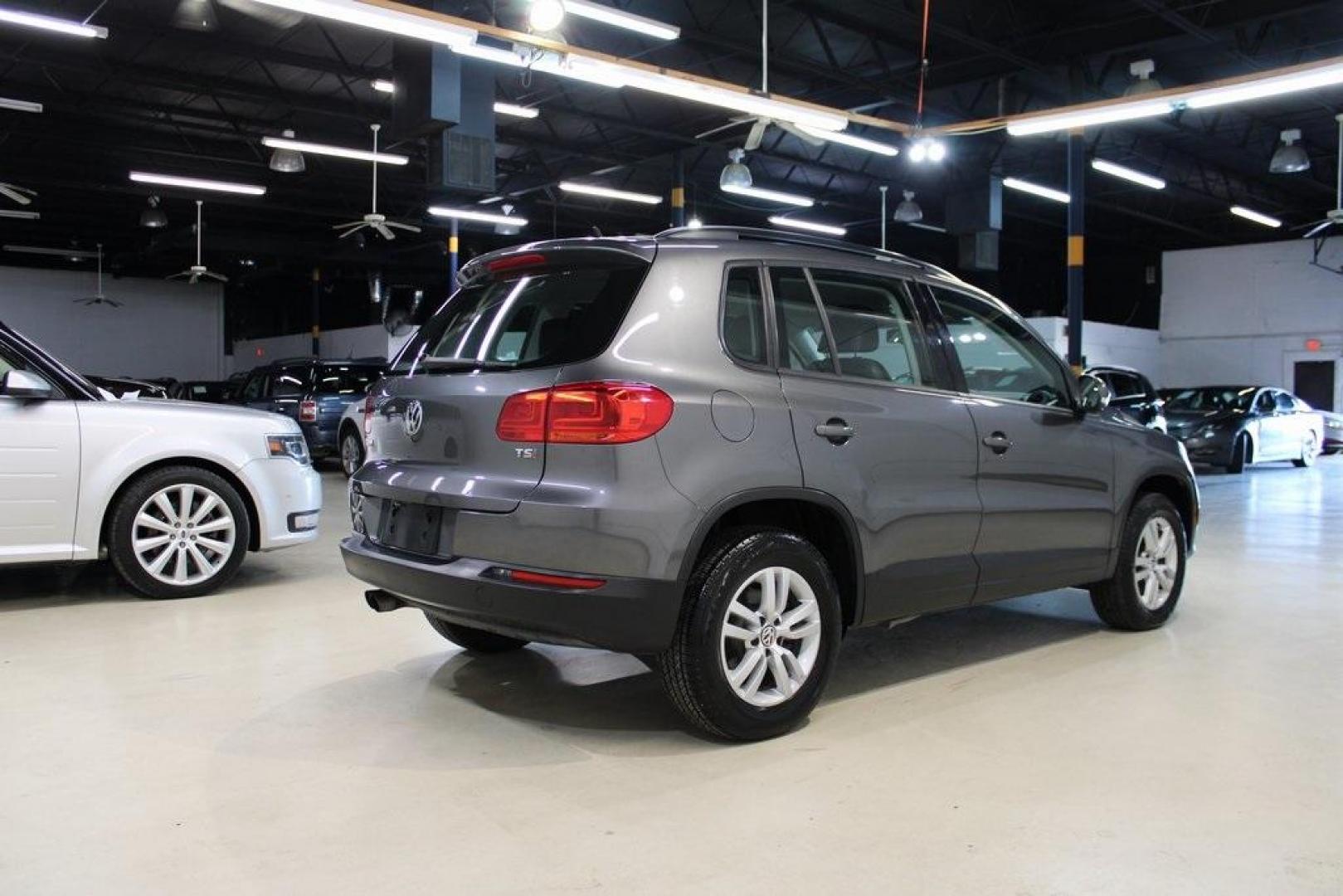 2016 Pepper / Gray /Charcoal Black Volkswagen Tiguan S (WVGAV7AX2GW) with an 2.0L 4-Cylinder Turbocharged engine, Automatic transmission, located at 15300 Midway Rd., Addison, TX, 75001, (972) 702-0011, 32.958321, -96.838074 - Photo#2