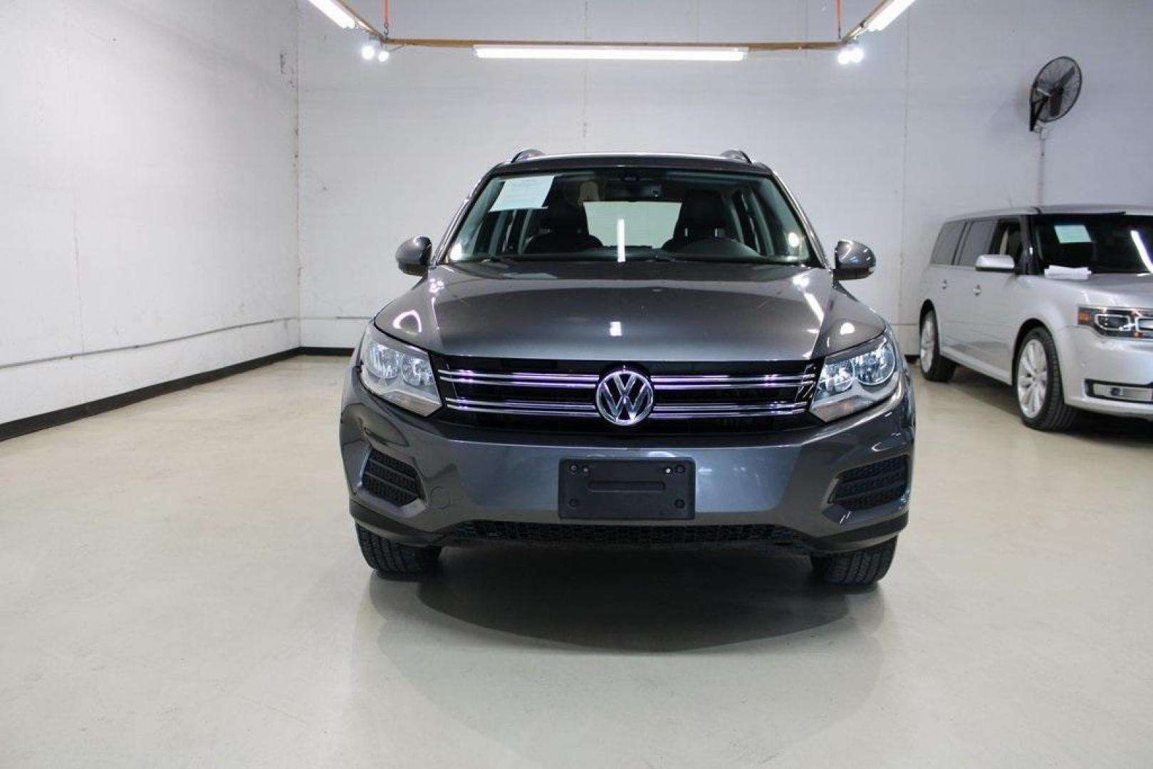 2016 Pepper / Gray /Charcoal Black Volkswagen Tiguan S (WVGAV7AX2GW) with an 2.0L 4-Cylinder Turbocharged engine, Automatic transmission, located at 15300 Midway Rd., Addison, TX, 75001, (972) 702-0011, 32.958321, -96.838074 - Photo#5