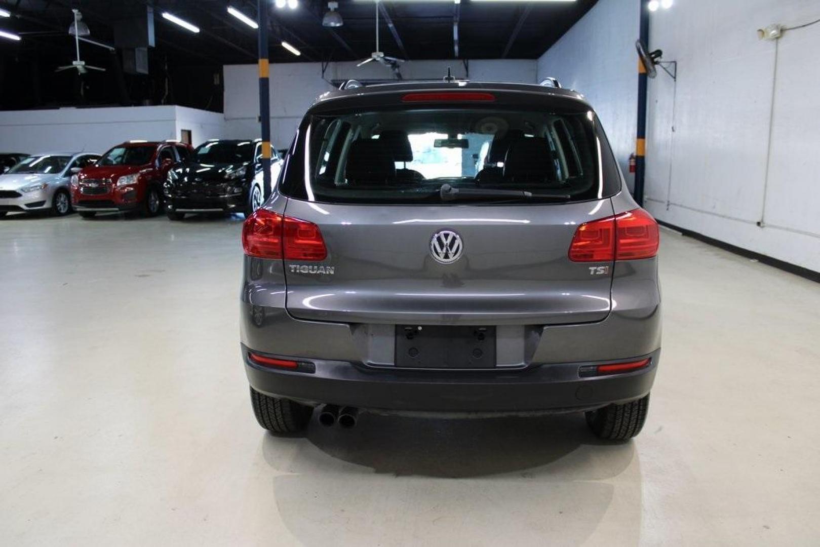 2016 Pepper / Gray /Charcoal Black Volkswagen Tiguan S (WVGAV7AX2GW) with an 2.0L 4-Cylinder Turbocharged engine, Automatic transmission, located at 15300 Midway Rd., Addison, TX, 75001, (972) 702-0011, 32.958321, -96.838074 - Photo#7