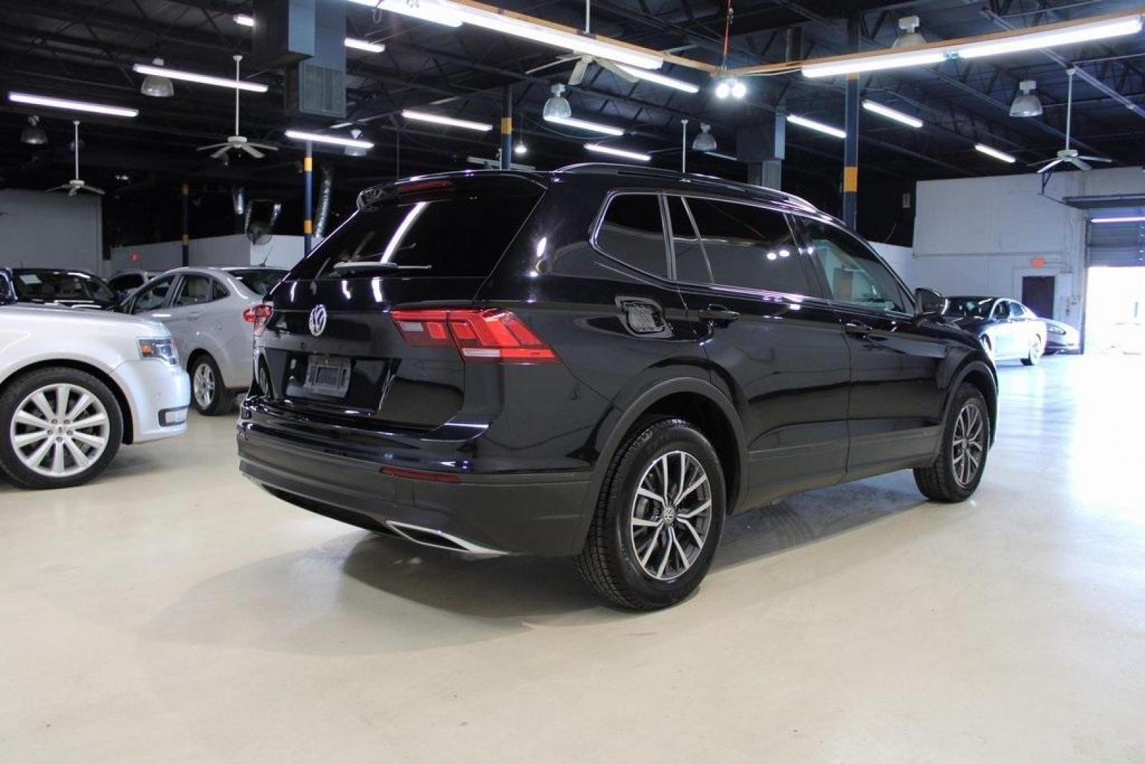 2019 Deep Black Pearl Volkswagen Tiguan 2.0T SE (3VV3B7AX0KM) with an 2.0L TSI DOHC engine, Automatic transmission, located at 15300 Midway Rd., Addison, TX, 75001, (972) 702-0011, 32.958321, -96.838074 - Photo#2