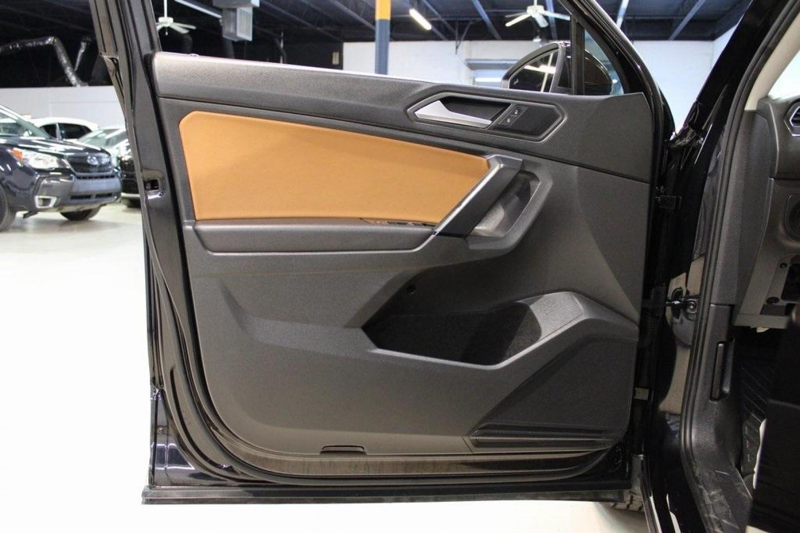 2019 Deep Black Pearl Volkswagen Tiguan 2.0T SE (3VV3B7AX0KM) with an 2.0L TSI DOHC engine, Automatic transmission, located at 15300 Midway Rd., Addison, TX, 75001, (972) 702-0011, 32.958321, -96.838074 - Photo#29