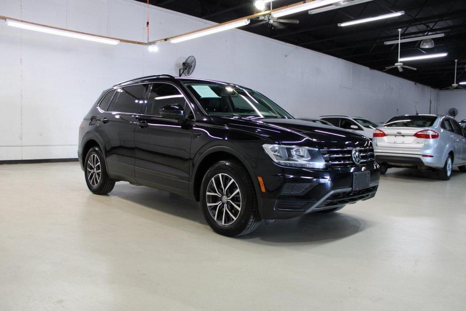 2019 Deep Black Pearl Volkswagen Tiguan 2.0T SE (3VV3B7AX0KM) with an 2.0L TSI DOHC engine, Automatic transmission, located at 15300 Midway Rd., Addison, TX, 75001, (972) 702-0011, 32.958321, -96.838074 - Photo#6