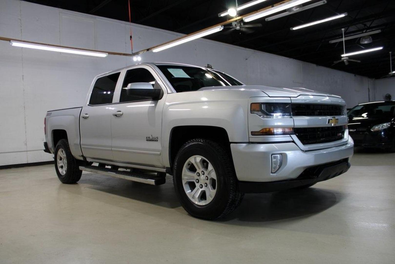 2018 Silver Ice Metallic /Black Chevrolet Silverado 1500 LT (3GCUKREC4JG) with an EcoTec3 5.3L V8 engine, Automatic transmission, located at 15300 Midway Rd., Addison, TX, 75001, (972) 702-0011, 32.958321, -96.838074 - Photo#7