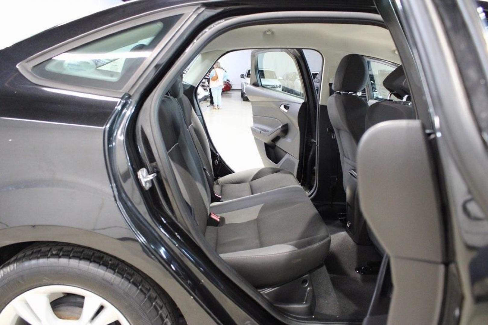2014 Tuxedo Black Metallic /Black Ford Focus SE (1FADP3F26EL) with an 2.0L 4-Cylinder DGI Flex Fuel DOHC engine, Automatic transmission, located at 15300 Midway Rd., Addison, TX, 75001, (972) 702-0011, 32.958321, -96.838074 - Introducing the 2014 Ford Focus SE, now available at Midway Auto Group in Addison, Texas. This compact sedan offers a harmonious blend of efficiency, comfort, and modern features, making it an excellent choice for daily commutes and city driving.<br><br>Key Features:<br><br>Engine: 2.0L 4-Cylinder<b - Photo#14