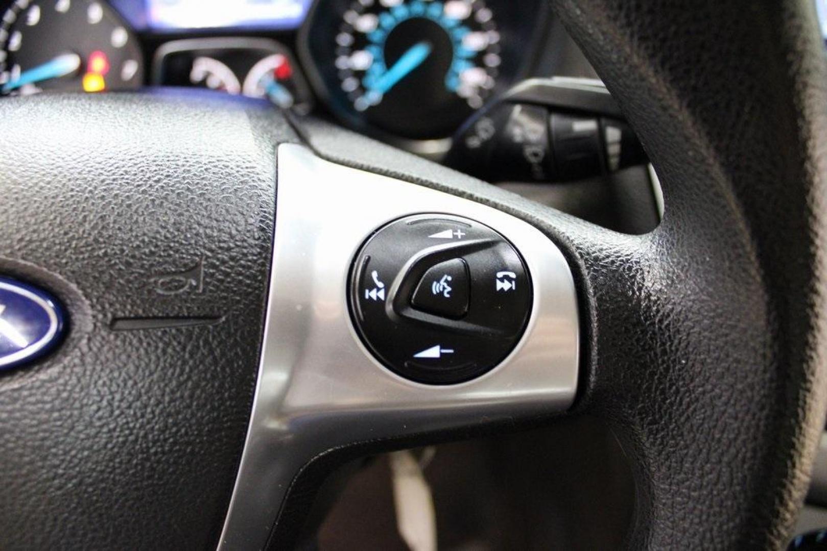 2014 Tuxedo Black Metallic /Black Ford Focus SE (1FADP3F26EL) with an 2.0L 4-Cylinder DGI Flex Fuel DOHC engine, Automatic transmission, located at 15300 Midway Rd., Addison, TX, 75001, (972) 702-0011, 32.958321, -96.838074 - Introducing the 2014 Ford Focus SE, now available at Midway Auto Group in Addison, Texas. This compact sedan offers a harmonious blend of efficiency, comfort, and modern features, making it an excellent choice for daily commutes and city driving.<br><br>Key Features:<br><br>Engine: 2.0L 4-Cylinder<b - Photo#19