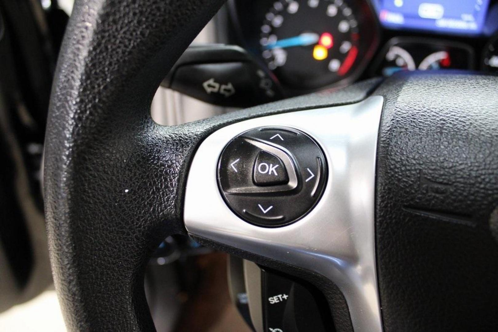 2014 Tuxedo Black Metallic /Black Ford Focus SE (1FADP3F26EL) with an 2.0L 4-Cylinder DGI Flex Fuel DOHC engine, Automatic transmission, located at 15300 Midway Rd., Addison, TX, 75001, (972) 702-0011, 32.958321, -96.838074 - Introducing the 2014 Ford Focus SE, now available at Midway Auto Group in Addison, Texas. This compact sedan offers a harmonious blend of efficiency, comfort, and modern features, making it an excellent choice for daily commutes and city driving.<br><br>Key Features:<br><br>Engine: 2.0L 4-Cylinder<b - Photo#20