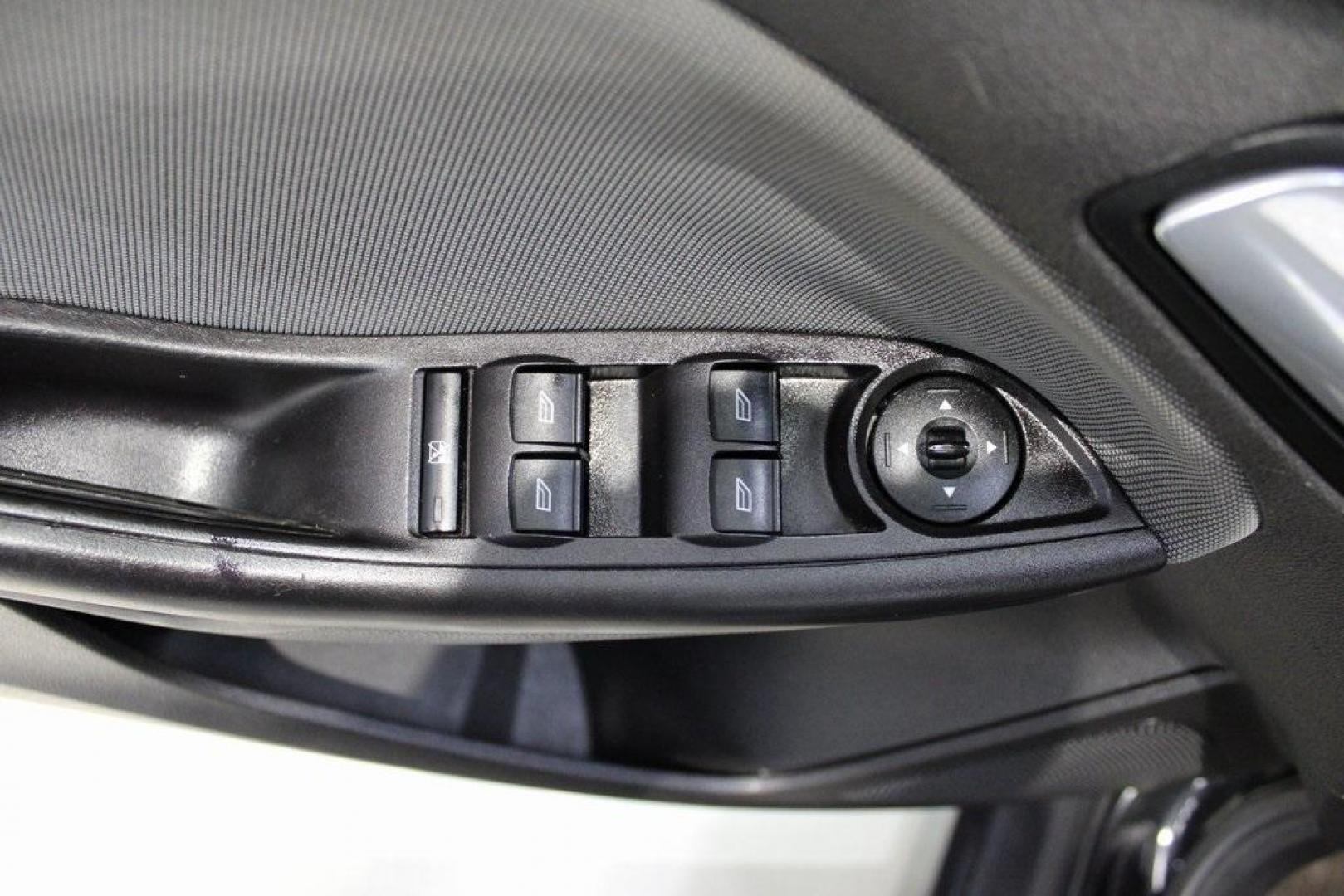 2014 Tuxedo Black Metallic /Black Ford Focus SE (1FADP3F26EL) with an 2.0L 4-Cylinder DGI Flex Fuel DOHC engine, Automatic transmission, located at 15300 Midway Rd., Addison, TX, 75001, (972) 702-0011, 32.958321, -96.838074 - Introducing the 2014 Ford Focus SE, now available at Midway Auto Group in Addison, Texas. This compact sedan offers a harmonious blend of efficiency, comfort, and modern features, making it an excellent choice for daily commutes and city driving.<br><br>Key Features:<br><br>Engine: 2.0L 4-Cylinder<b - Photo#24
