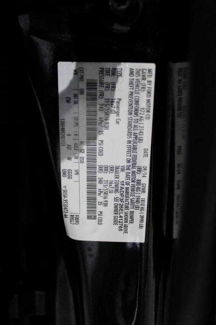 2014 Tuxedo Black Metallic /Black Ford Focus SE (1FADP3F26EL) with an 2.0L 4-Cylinder DGI Flex Fuel DOHC engine, Automatic transmission, located at 15300 Midway Rd., Addison, TX, 75001, (972) 702-0011, 32.958321, -96.838074 - Introducing the 2014 Ford Focus SE, now available at Midway Auto Group in Addison, Texas. This compact sedan offers a harmonious blend of efficiency, comfort, and modern features, making it an excellent choice for daily commutes and city driving.<br><br>Key Features:<br><br>Engine: 2.0L 4-Cylinder<b - Photo#27