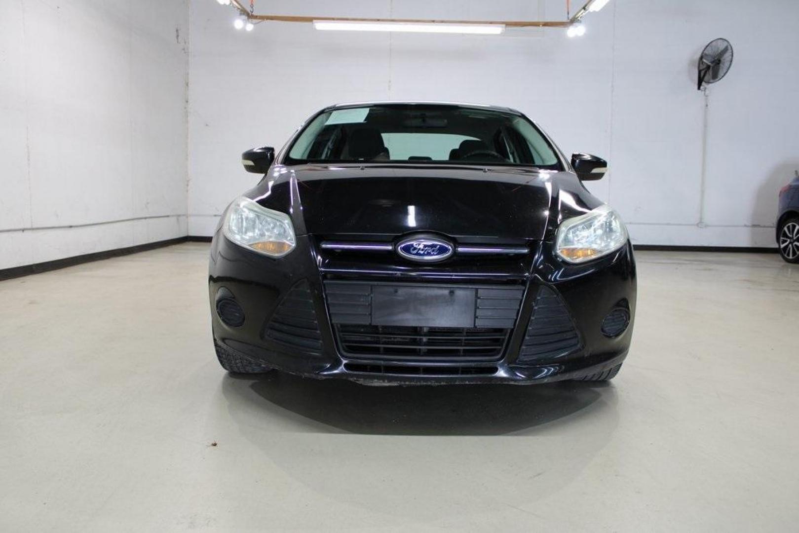 2014 Tuxedo Black Metallic /Black Ford Focus SE (1FADP3F26EL) with an 2.0L 4-Cylinder DGI Flex Fuel DOHC engine, Automatic transmission, located at 15300 Midway Rd., Addison, TX, 75001, (972) 702-0011, 32.958321, -96.838074 - Introducing the 2014 Ford Focus SE, now available at Midway Auto Group in Addison, Texas. This compact sedan offers a harmonious blend of efficiency, comfort, and modern features, making it an excellent choice for daily commutes and city driving.<br><br>Key Features:<br><br>Engine: 2.0L 4-Cylinder<b - Photo#5