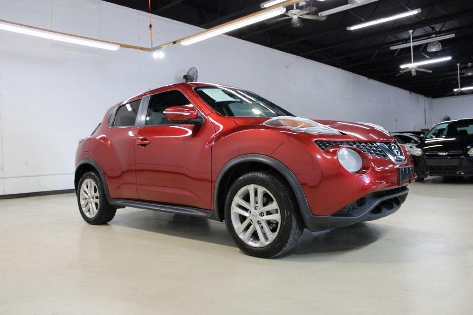 2015 Cayenne Red Pearl /Black/Red Nissan Juke SV (JN8AF5MR4FT) with an 1.6L I4 DOHC 16V engine, CVT transmission, located at 15300 Midway Rd., Addison, TX, 75001, (972) 702-0011, 32.958321, -96.838074 - HOME OF THE NO HAGGLE PRICE - WHOLESALE PRICES TO THE PUBLIC!! Juke SV, 4D Sport Utility, 1.6L I4 DOHC 16V, CVT with Xtronic, FWD, Cayenne Red Pearl, Black/Red Cloth.<br><br>Cayenne Red Pearl 2015 Nissan Juke SV<br><br>Recent Arrival! 28/32 City/Highway MPG<br><br><br>At Midway Auto Group, we strive - Photo#6