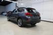 2015 Mineral Grey Metallic /Black BMW X1 xDrive28i (WBAVL1C56FV) with an 2.0L 4-Cylinder DOHC 16V TwinPower Turbo engine, Automatic transmission, located at 15300 Midway Rd., Addison, TX, 75001, (972) 702-0011, 32.958321, -96.838074 - Introducing the 2015 BMW X1 xDrive28i, now available at Midway Auto Group in Addison, Texas. This compact luxury SUV combines BMW's renowned performance with versatility and style, making it an excellent choice for both city driving and weekend adventures.<br><br>Key Features:<br><br>Engine: 2.0-lit - Photo#3