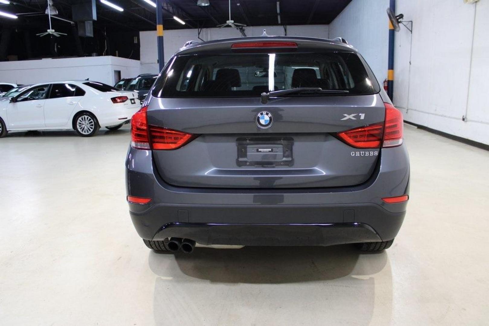 2015 Mineral Grey Metallic /Black BMW X1 xDrive28i (WBAVL1C56FV) with an 2.0L 4-Cylinder DOHC 16V TwinPower Turbo engine, Automatic transmission, located at 15300 Midway Rd., Addison, TX, 75001, (972) 702-0011, 32.958321, -96.838074 - Introducing the 2015 BMW X1 xDrive28i, now available at Midway Auto Group in Addison, Texas. This compact luxury SUV combines BMW's renowned performance with versatility and style, making it an excellent choice for both city driving and weekend adventures.<br><br>Key Features:<br><br>Engine: 2.0-lit - Photo#7