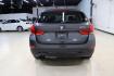 2015 Mineral Grey Metallic /Black BMW X1 xDrive28i (WBAVL1C56FV) with an 2.0L 4-Cylinder DOHC 16V TwinPower Turbo engine, Automatic transmission, located at 15300 Midway Rd., Addison, TX, 75001, (972) 702-0011, 32.958321, -96.838074 - Introducing the 2015 BMW X1 xDrive28i, now available at Midway Auto Group in Addison, Texas. This compact luxury SUV combines BMW's renowned performance with versatility and style, making it an excellent choice for both city driving and weekend adventures.<br><br>Key Features:<br><br>Engine: 2.0-lit - Photo#7