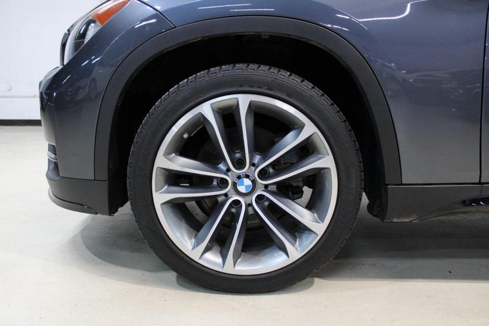 2015 Mineral Grey Metallic /Black BMW X1 xDrive28i (WBAVL1C56FV) with an 2.0L 4-Cylinder DOHC 16V TwinPower Turbo engine, Automatic transmission, located at 15300 Midway Rd., Addison, TX, 75001, (972) 702-0011, 32.958321, -96.838074 - Introducing the 2015 BMW X1 xDrive28i, now available at Midway Auto Group in Addison, Texas. This compact luxury SUV combines BMW's renowned performance with versatility and style, making it an excellent choice for both city driving and weekend adventures.<br><br>Key Features:<br><br>Engine: 2.0-lit - Photo#8