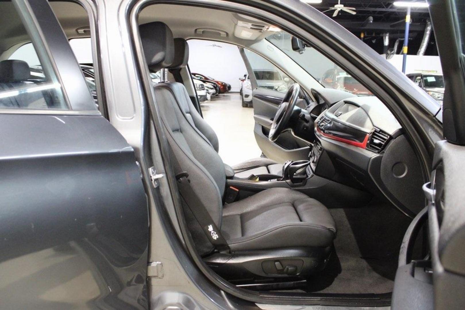 2015 Mineral Grey Metallic /Black BMW X1 xDrive28i (WBAVL1C56FV) with an 2.0L 4-Cylinder DOHC 16V TwinPower Turbo engine, Automatic transmission, located at 15300 Midway Rd., Addison, TX, 75001, (972) 702-0011, 32.958321, -96.838074 - Introducing the 2015 BMW X1 xDrive28i, now available at Midway Auto Group in Addison, Texas. This compact luxury SUV combines BMW's renowned performance with versatility and style, making it an excellent choice for both city driving and weekend adventures.<br><br>Key Features:<br><br>Engine: 2.0-lit - Photo#14