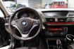 2015 Mineral Grey Metallic /Black BMW X1 xDrive28i (WBAVL1C56FV) with an 2.0L 4-Cylinder DOHC 16V TwinPower Turbo engine, Automatic transmission, located at 15300 Midway Rd., Addison, TX, 75001, (972) 702-0011, 32.958321, -96.838074 - Introducing the 2015 BMW X1 xDrive28i, now available at Midway Auto Group in Addison, Texas. This compact luxury SUV combines BMW's renowned performance with versatility and style, making it an excellent choice for both city driving and weekend adventures.<br><br>Key Features:<br><br>Engine: 2.0-lit - Photo#17