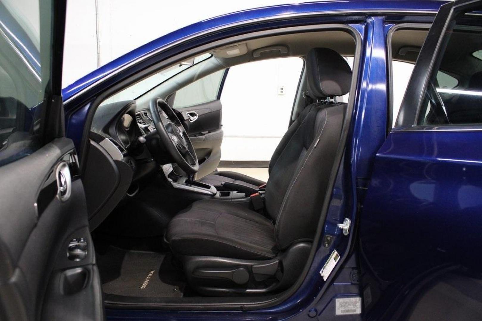 2017 Deep Blue Pearl /Charcoal Nissan Sentra SV (3N1AB7APXHL) with an 1.8L 4-Cylinder DOHC 16V engine, CVT transmission, located at 15300 Midway Rd., Addison, TX, 75001, (972) 702-0011, 32.958321, -96.838074 - HOME OF THE NO HAGGLE PRICE - WHOLESALE PRICES TO THE PUBLIC!! Sentra SV, 4D Sedan, 1.8L 4-Cylinder DOHC 16V, CVT with Xtronic, FWD, Deep Blue Pearl, Charcoal Cloth.<br><br>Deep Blue Pearl 2017 Nissan Sentra SV<br><br>29/37 City/Highway MPG<br><br><br>At Midway Auto Group, we strive to provide you w - Photo#13