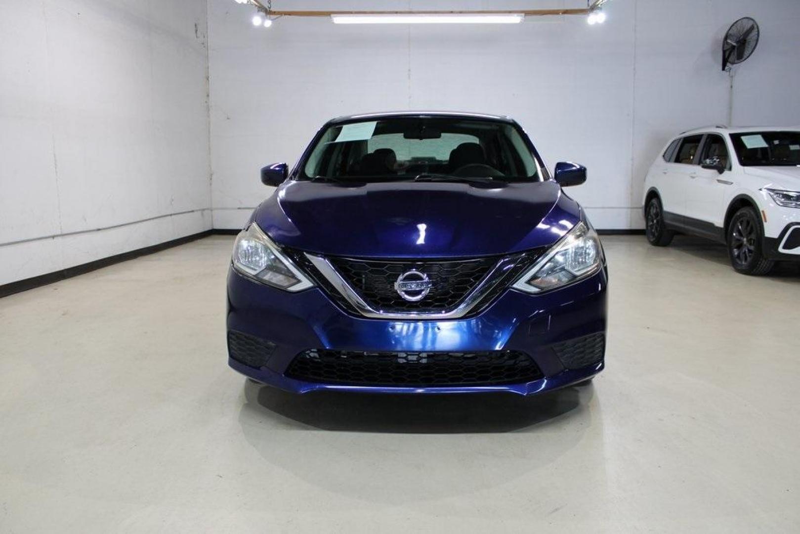2017 Deep Blue Pearl /Charcoal Nissan Sentra SV (3N1AB7APXHL) with an 1.8L 4-Cylinder DOHC 16V engine, CVT transmission, located at 15300 Midway Rd., Addison, TX, 75001, (972) 702-0011, 32.958321, -96.838074 - HOME OF THE NO HAGGLE PRICE - WHOLESALE PRICES TO THE PUBLIC!! Sentra SV, 4D Sedan, 1.8L 4-Cylinder DOHC 16V, CVT with Xtronic, FWD, Deep Blue Pearl, Charcoal Cloth.<br><br>Deep Blue Pearl 2017 Nissan Sentra SV<br><br>29/37 City/Highway MPG<br><br><br>At Midway Auto Group, we strive to provide you w - Photo#5