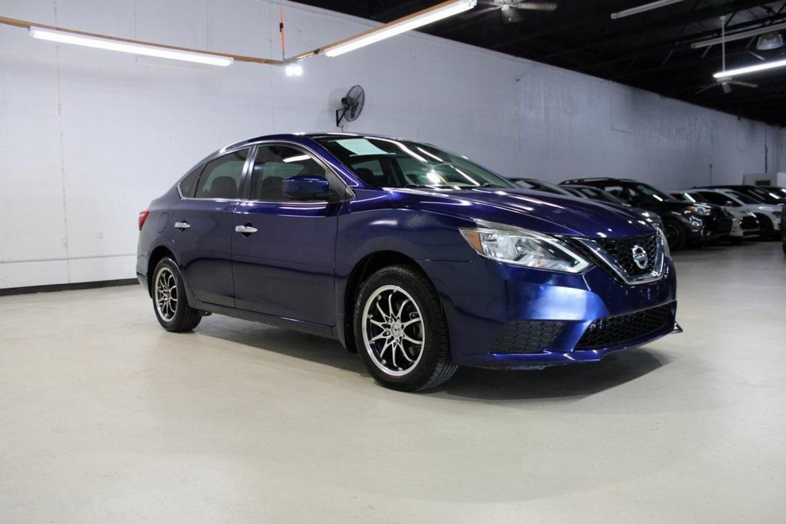 2017 Deep Blue Pearl /Charcoal Nissan Sentra SV (3N1AB7APXHL) with an 1.8L 4-Cylinder DOHC 16V engine, CVT transmission, located at 15300 Midway Rd., Addison, TX, 75001, (972) 702-0011, 32.958321, -96.838074 - HOME OF THE NO HAGGLE PRICE - WHOLESALE PRICES TO THE PUBLIC!! Sentra SV, 4D Sedan, 1.8L 4-Cylinder DOHC 16V, CVT with Xtronic, FWD, Deep Blue Pearl, Charcoal Cloth.<br><br>Deep Blue Pearl 2017 Nissan Sentra SV<br><br>29/37 City/Highway MPG<br><br><br>At Midway Auto Group, we strive to provide you w - Photo#6
