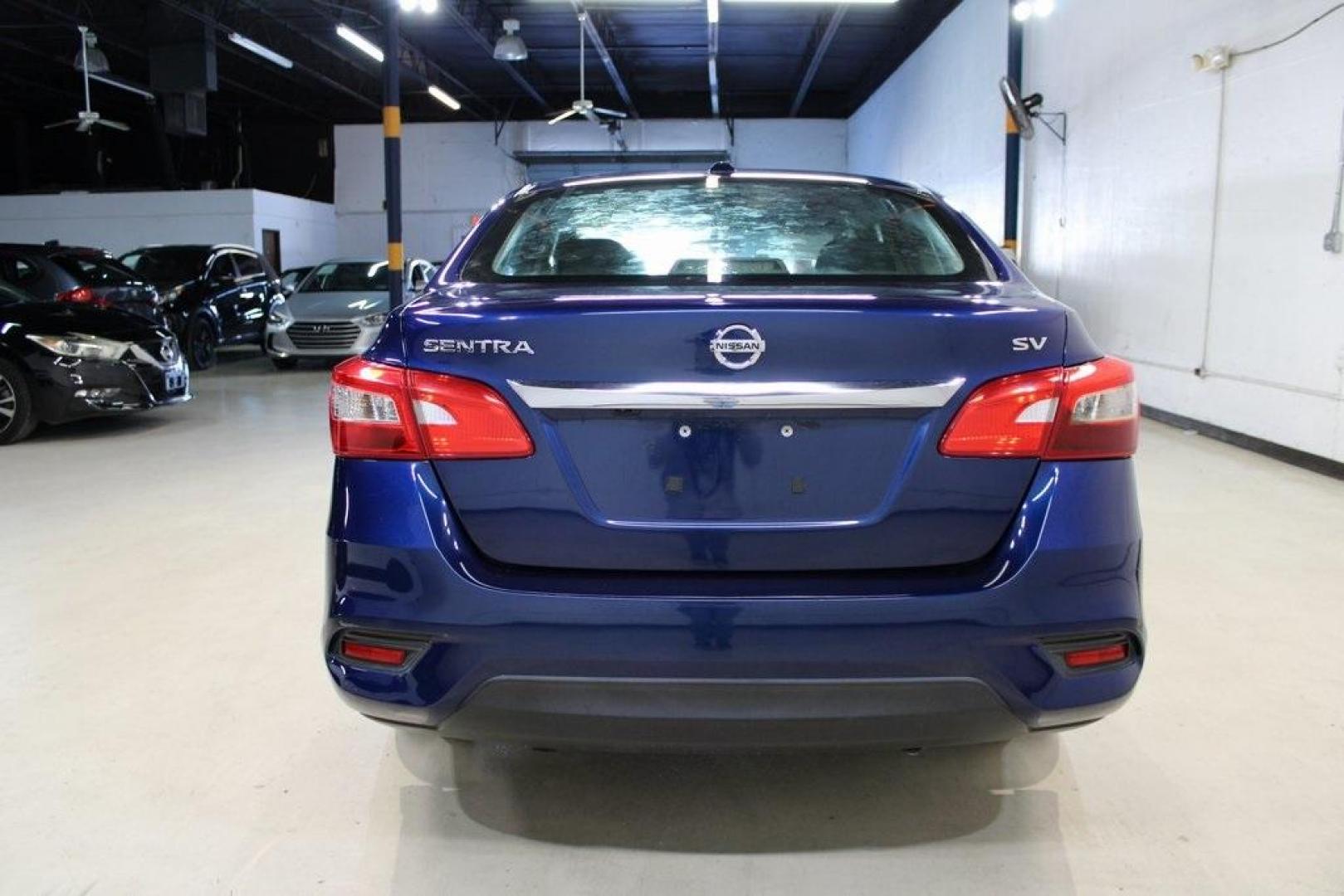 2017 Deep Blue Pearl /Charcoal Nissan Sentra SV (3N1AB7APXHL) with an 1.8L 4-Cylinder DOHC 16V engine, CVT transmission, located at 15300 Midway Rd., Addison, TX, 75001, (972) 702-0011, 32.958321, -96.838074 - HOME OF THE NO HAGGLE PRICE - WHOLESALE PRICES TO THE PUBLIC!! Sentra SV, 4D Sedan, 1.8L 4-Cylinder DOHC 16V, CVT with Xtronic, FWD, Deep Blue Pearl, Charcoal Cloth.<br><br>Deep Blue Pearl 2017 Nissan Sentra SV<br><br>29/37 City/Highway MPG<br><br><br>At Midway Auto Group, we strive to provide you w - Photo#7