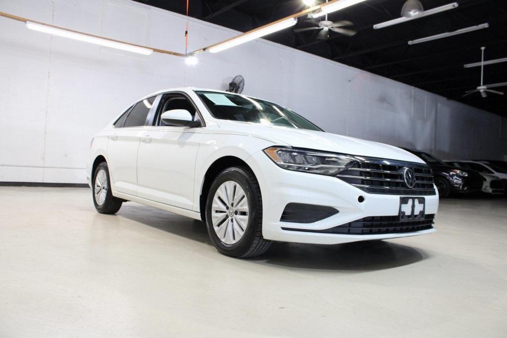 2019 White /Titan Black Volkswagen Jetta 1.4T S (3VWCB7BUXKM) with an 1.4L TSI engine, Automatic transmission, located at 15300 Midway Rd., Addison, TX, 75001, (972) 702-0011, 32.958321, -96.838074 - ntroducing the 2019 Volkswagen Jetta 1.4T S, now available at Midway Auto Group in Addison, Texas. This stylish sedan combines performance, efficiency, and modern features, making it an excellent choice for both daily commutes and weekend drives.<br><br>Key Features:<br><br>Engine: 1.4L TSI Turbocha - Photo#1