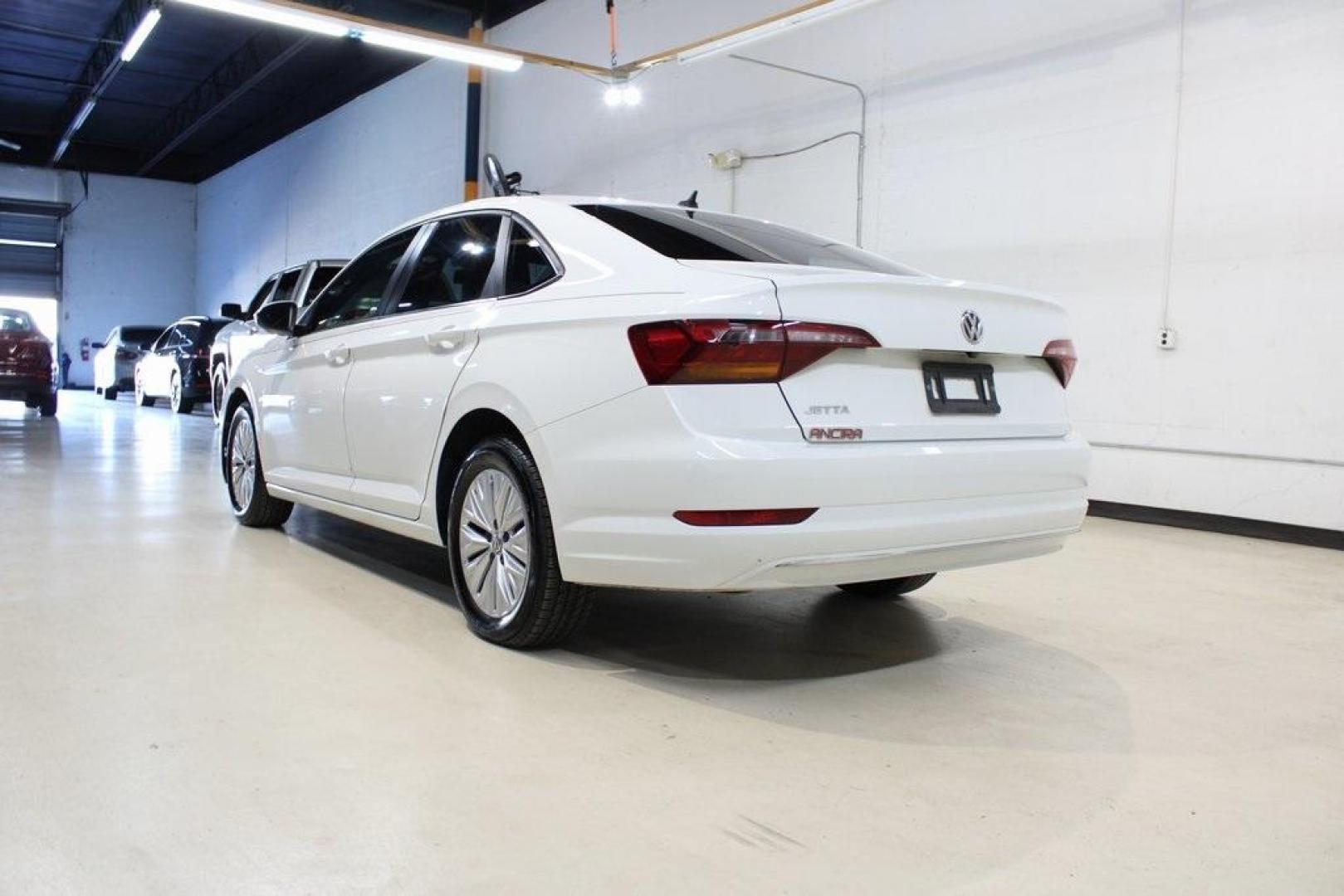 2019 White /Titan Black Volkswagen Jetta 1.4T S (3VWCB7BUXKM) with an 1.4L TSI engine, Automatic transmission, located at 15300 Midway Rd., Addison, TX, 75001, (972) 702-0011, 32.958321, -96.838074 - ntroducing the 2019 Volkswagen Jetta 1.4T S, now available at Midway Auto Group in Addison, Texas. This stylish sedan combines performance, efficiency, and modern features, making it an excellent choice for both daily commutes and weekend drives.<br><br>Key Features:<br><br>Engine: 1.4L TSI Turbocha - Photo#3