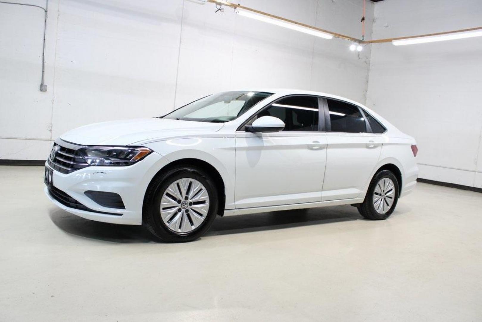 2019 White /Titan Black Volkswagen Jetta 1.4T S (3VWCB7BUXKM) with an 1.4L TSI engine, Automatic transmission, located at 15300 Midway Rd., Addison, TX, 75001, (972) 702-0011, 32.958321, -96.838074 - ntroducing the 2019 Volkswagen Jetta 1.4T S, now available at Midway Auto Group in Addison, Texas. This stylish sedan combines performance, efficiency, and modern features, making it an excellent choice for both daily commutes and weekend drives.<br><br>Key Features:<br><br>Engine: 1.4L TSI Turbocha - Photo#4