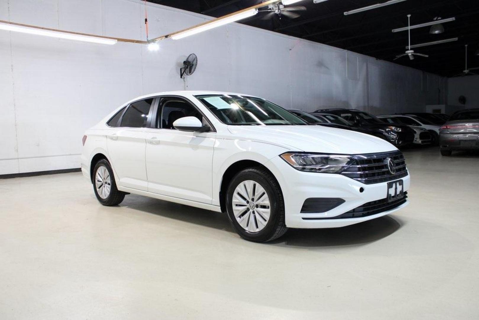 2019 White /Titan Black Volkswagen Jetta 1.4T S (3VWCB7BUXKM) with an 1.4L TSI engine, Automatic transmission, located at 15300 Midway Rd., Addison, TX, 75001, (972) 702-0011, 32.958321, -96.838074 - ntroducing the 2019 Volkswagen Jetta 1.4T S, now available at Midway Auto Group in Addison, Texas. This stylish sedan combines performance, efficiency, and modern features, making it an excellent choice for both daily commutes and weekend drives.<br><br>Key Features:<br><br>Engine: 1.4L TSI Turbocha - Photo#6