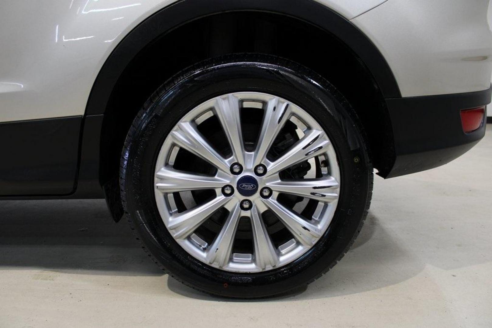 2017 White Gold /Charcoal Black Ford Escape Titanium (1FMCU0J91HU) with an EcoBoost 2.0L I4 GTDi DOHC Turbocharged VCT engine, Automatic transmission, located at 15300 Midway Rd., Addison, TX, 75001, (972) 702-0011, 32.958321, -96.838074 - Photo#9