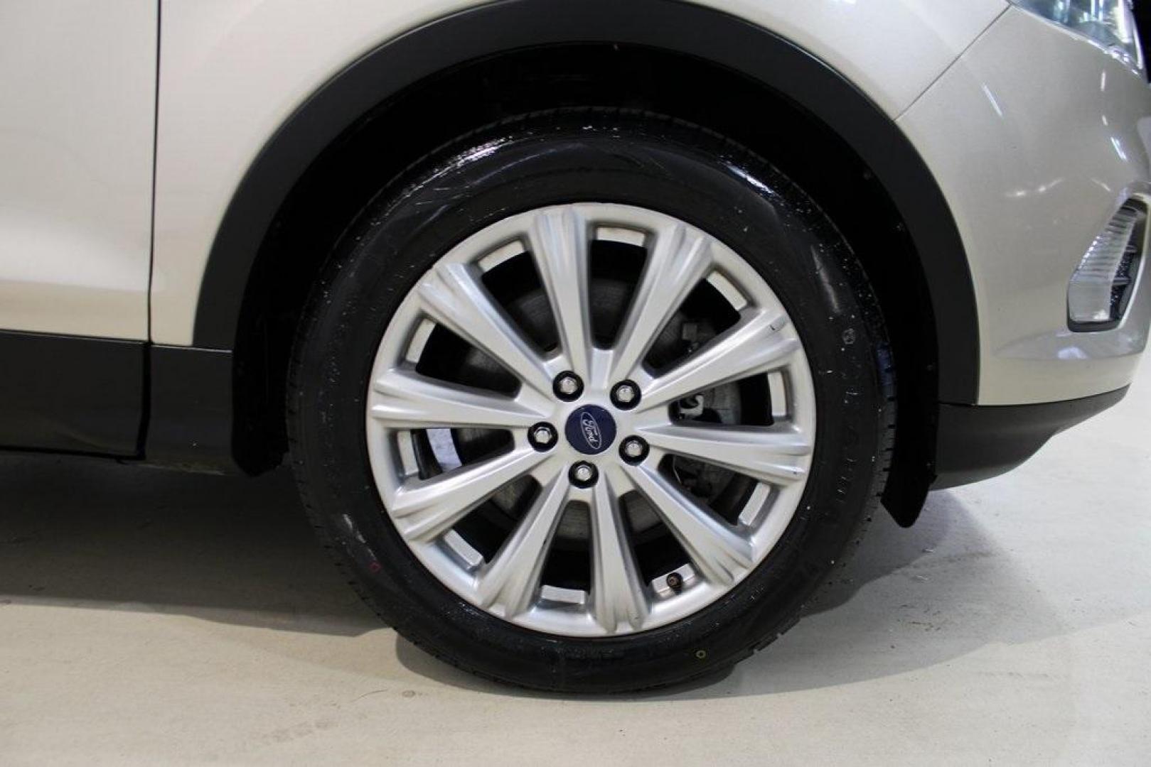 2017 White Gold /Charcoal Black Ford Escape Titanium (1FMCU0J91HU) with an EcoBoost 2.0L I4 GTDi DOHC Turbocharged VCT engine, Automatic transmission, located at 15300 Midway Rd., Addison, TX, 75001, (972) 702-0011, 32.958321, -96.838074 - Photo#11